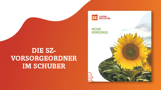 ein Buch mit einer Sonnenblume im Hintergrund